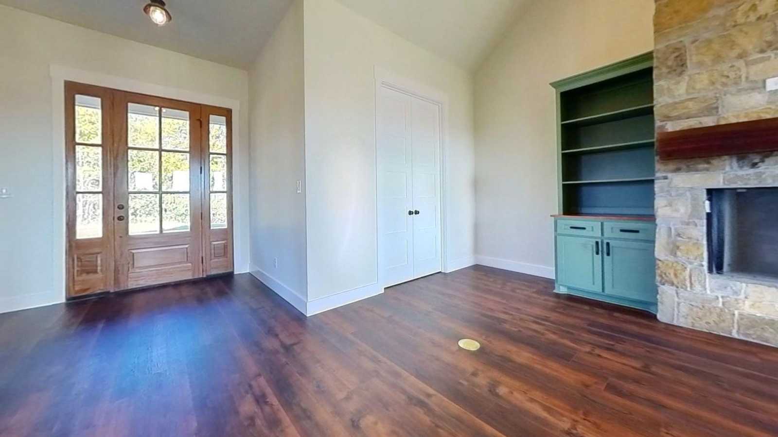 interior living room with wood floor and outdoor living spaces.jpg | GPS: 33.554350, -94.725374